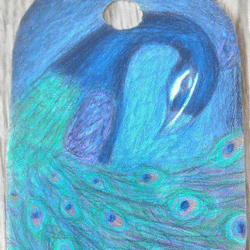 Shrinky Dink Pendant with a peacock drawn on it with prismacolor pencils