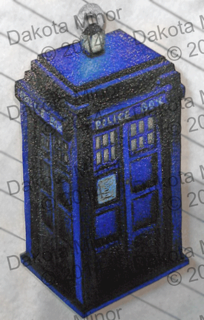 Shrinky dink pendant of a blue Tardis / Police call box